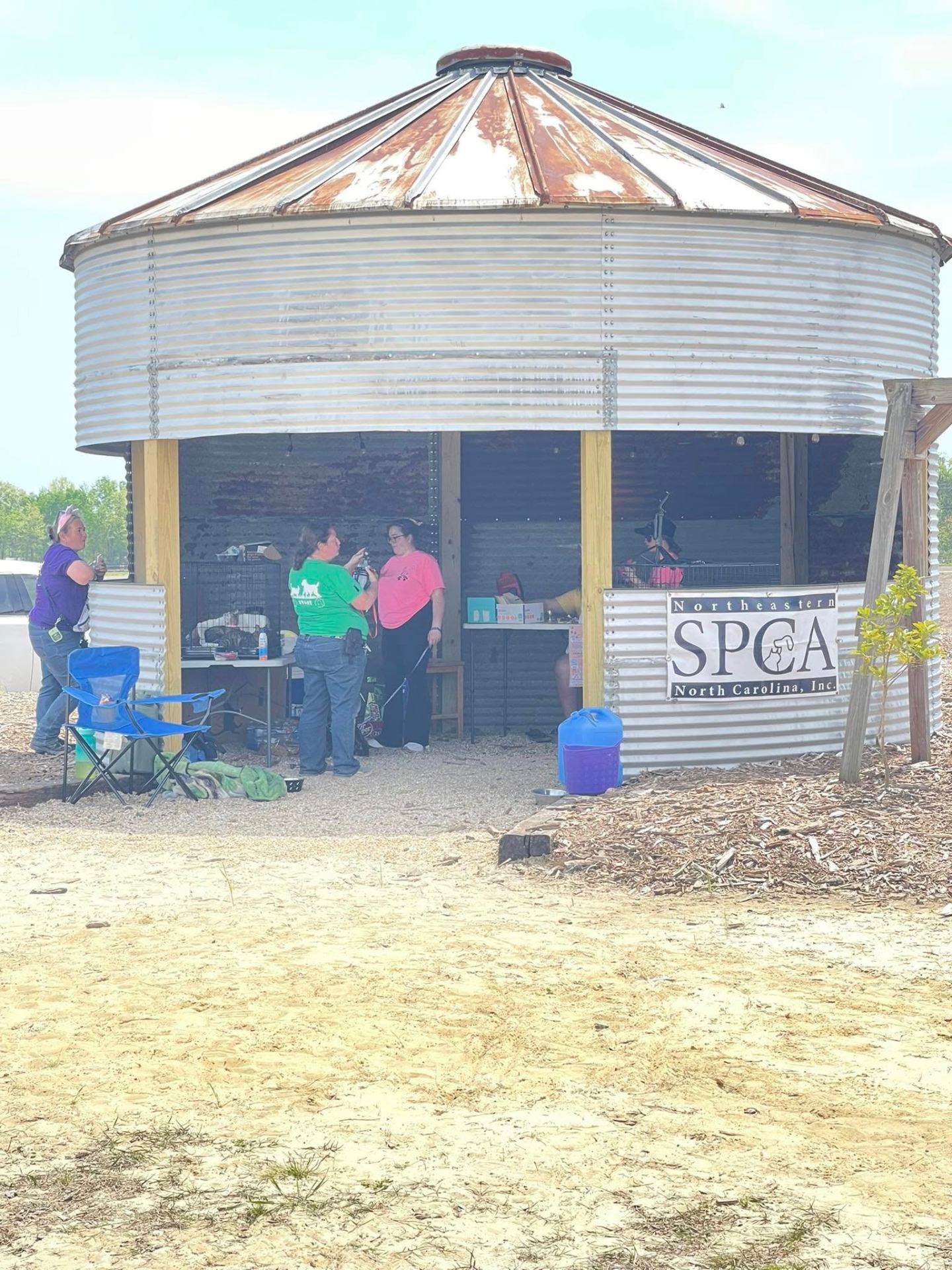 Renovated grain silo hosting the Northeastern SPCA of NC vendor booth at Chubby's Farm