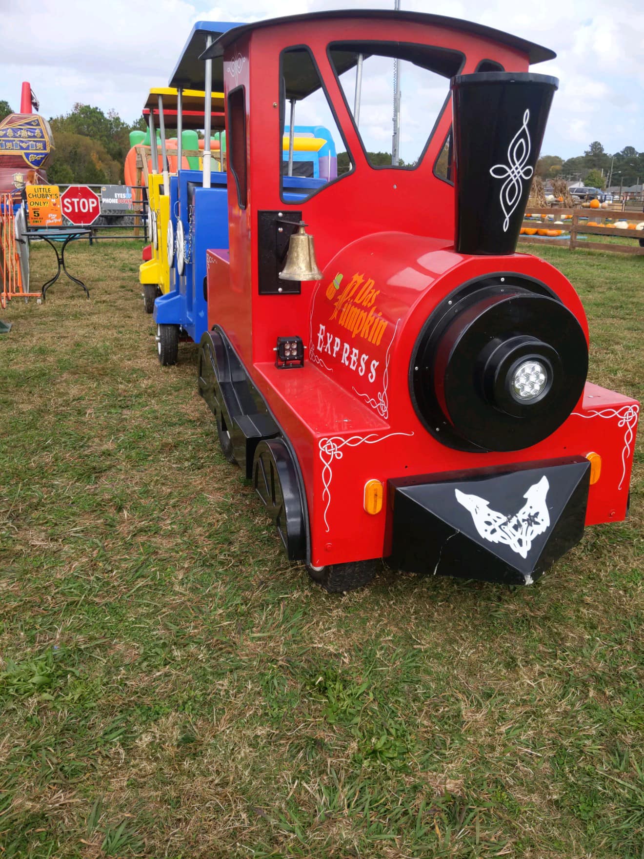Chubby's Express red train engine ready to roll at the farm